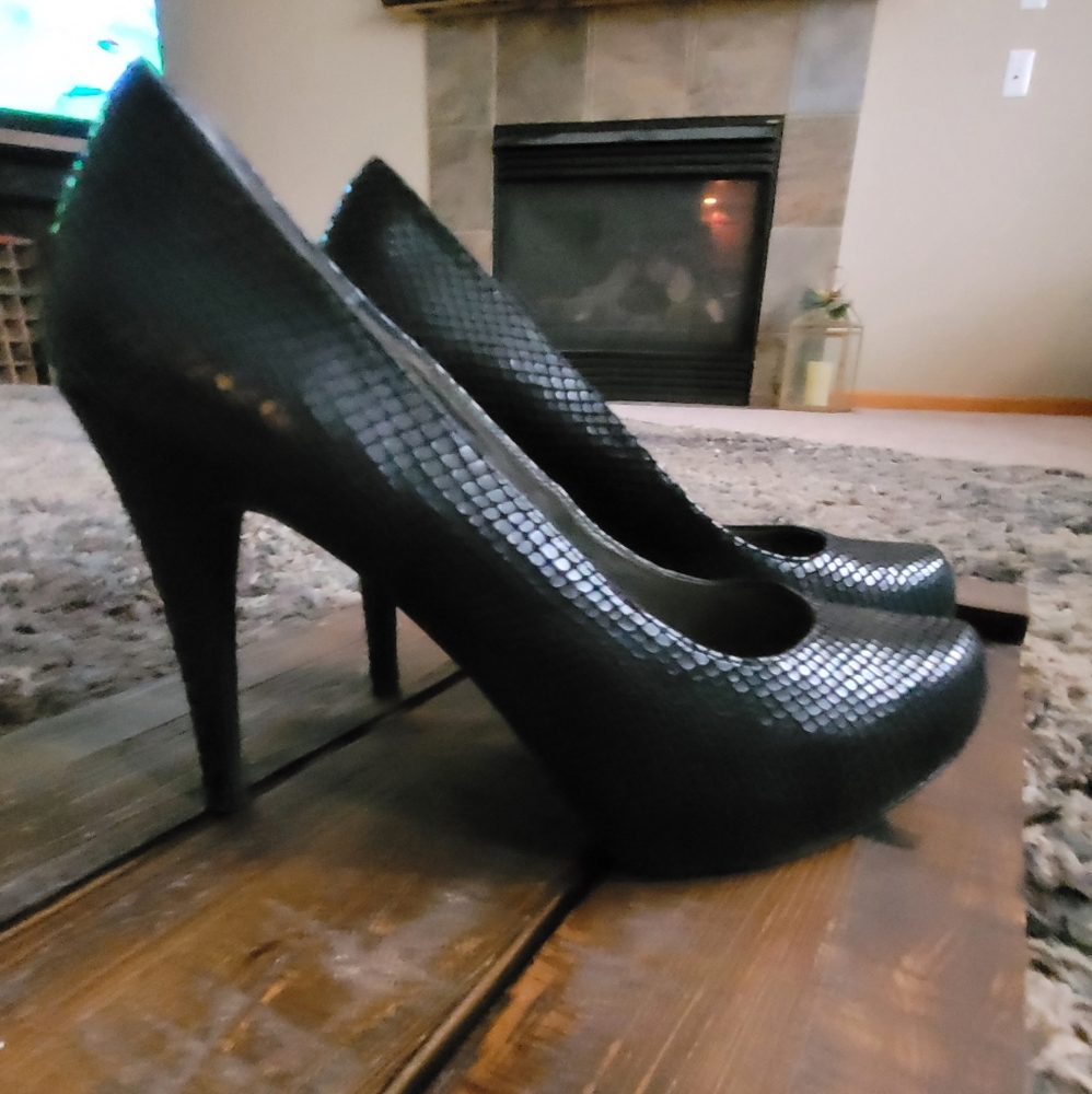 Black pumps,  worn once